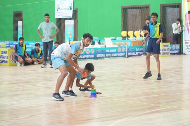 Children playing Pittu